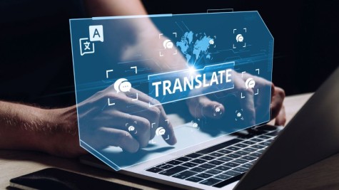 Das Wort Translate steht über Laptop-Tastatur